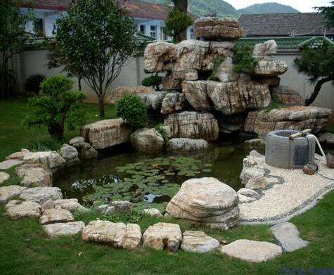 山东小型庭院鱼池龟纹石假山制作公司